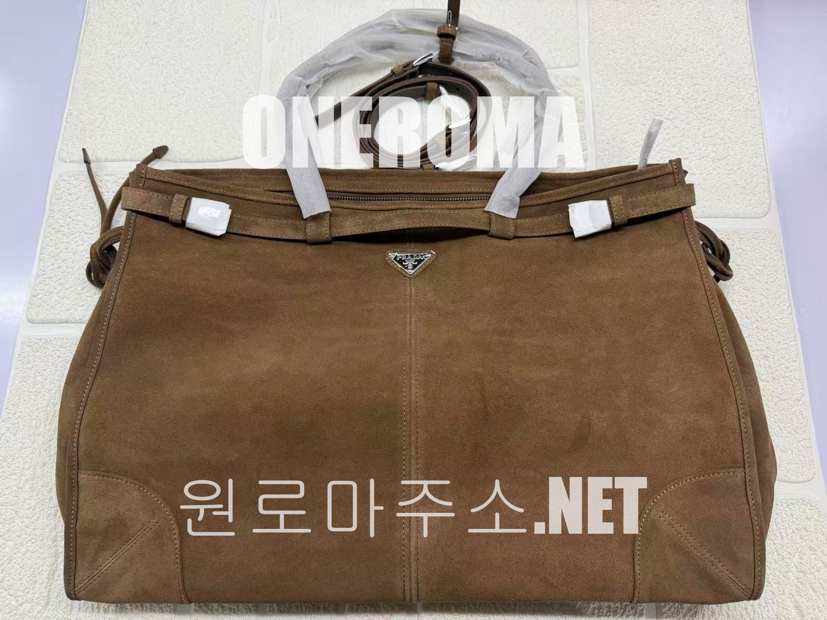 김*지 고객님 프라다 스웨이트 토트백